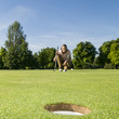 Foto: Golferin auf dem Grün Golferin auf dem Grün