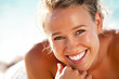 Beautiful young woman on the beach.