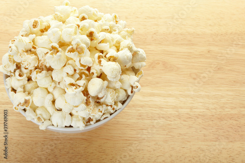 Photo: Popcorn bowl on table Popcorn bowl on table