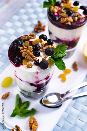 Foto: cream dessert with black currants and nuts cream dessert with black currants and nuts