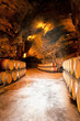 wine barrels in a winery, France