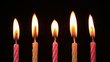 Candles on a Birthday cake burning down, time lapse, reversing