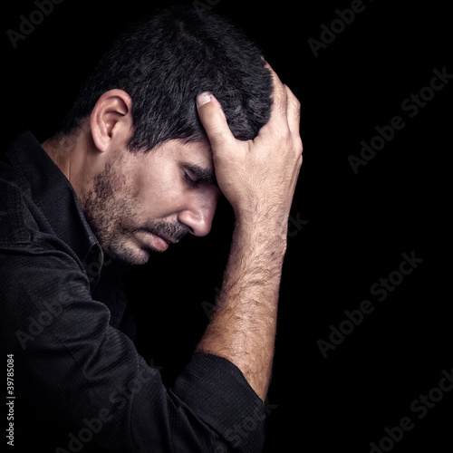 Photo: Portrait of a very sad young hispanic man Portrait of a very sad young hispanic man