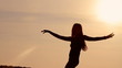 girl on the beach and evening sunset