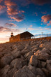 Lighthouse on the pier - Scenic view of rocky sea defences
