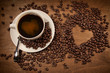 Photo: Heart shape from coffee beans on wood Heart shape from coffee beans on wood