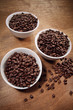 Coffee in white bowls on wood Coffee in white bowls on wood