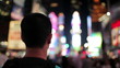 Tourist in Times Square Taking Picture