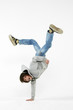 boy dancing break dance on a white background