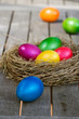Photo: Easter eggs lying on a garden table Easter eggs lying on a garden table