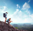 Backpackers on a rock