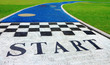 Photo: Jogging track in the park with start sign Jogging track in the park with start sign