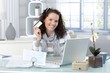 Foto: Happy woman shopping on Internet Happy woman shopping on Internet