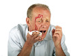 Wounded man with face full of blood
