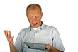 Happy man with his tablet computer