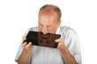 Angry man is consuming his tablet computer