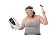 Photo: Angry fat woman with hammer and scale Angry fat woman with hammer and scale