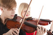 Foto: Image of musicians playing violins Image of musicians playing violins