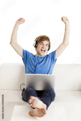 Photo: Happy man on the couch Happy man on the couch