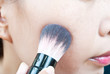 Photo: Close up Asian young woman make up. Close up Asian young woman make up.