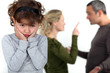 cute little girl distressed over parents' quarrel