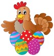 Hen with various Easter eggs