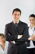 Boss stood with employees