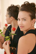 Portrait of beauty young woman with rose at the mirrow Portrait of beauty young woman with rose at the mirrow