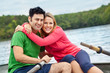 Couple in a rowboat at the lake