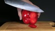 Cutting red Peppers