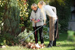 Elderly woman with her gardener