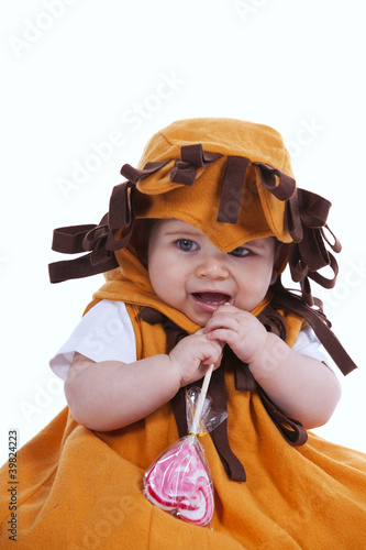 Photo: Baby with a lion mask Baby with a lion mask
