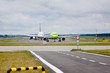 Front view on airplanes taxiing to the runway Front view on airplanes taxiing to the runway