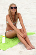 Girl sitting on the beach