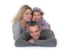 Young family laying on the floor together