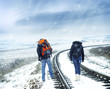 tourists on winter railroad