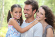 Portrait of parents with child