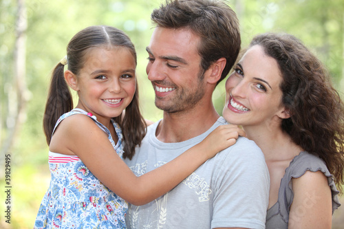 Photo: Portrait of parents with child Portrait of parents with child