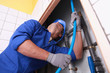 Plumber pulling tube