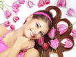 Beautiful girl with tulips