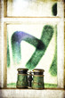 green binoculars next to a window