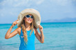 Girl in big hat relax ocean background Girl in big hat relax ocean background