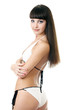 Sexy underwear model posing in a studio in a handmade swimsuit Sexy underwear model posing in a studio in a handmade swimsuit