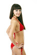 Sexy underwear model posing in a studio in a handmade swimsuit Sexy underwear model posing in a studio in a handmade swimsuit