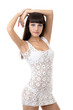 Sexy model posing in a studio in a handmade knitted dress Sexy model posing in a studio in a handmade knitted dress