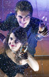 Couple at celebration with glasses of champagne Couple at celebration with glasses of champagne