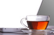 Tea flowing in cup