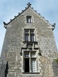 Old ornate stone house in Poitiers, France