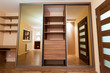Modern apartment interior with huge wardrobe