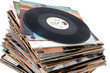 Pile of old vinyl records isolated on white background